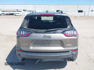 2019 Jeep Cherokee Latitude Plus with VIN 1C4PJMLBXKD233749, listed as a IAAI auction lot 41937698 with 103,988 mi miles and . Bid and sale history available at DreamBid. Image 17.