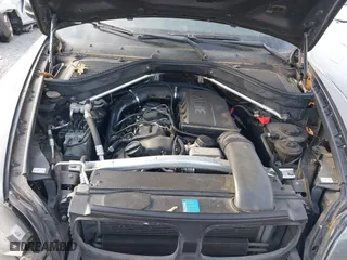 2011 BMW X5 35i with VIN 5UXZV4C58BL406373, listed as a IAAI auction lot 41715817 with 101,900 mi miles. Bid and sale history available at carsss.com. Image 10.