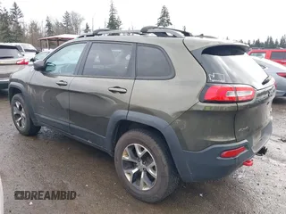 2015 Jeep Cherokee Trailhawk with VIN 1C4PJMBB5FW510514, listed as a IAAI auction lot 41492111 with 98,482 mi miles and . Bid and sale history available at DreamBid. Image 15.