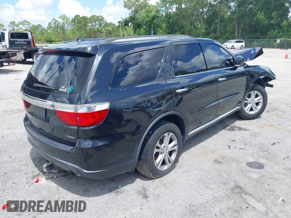 2013 Dodge Durango Crew with VIN 1C4RDHDG9DC684746, listed as a IAAI auction lot 42473302 with 122,602 mi miles and . Bid and sale history available at DreamBid. Image 4.