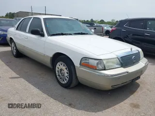 2004 Mercury Grand Marquis GS z VIN 2MEFM74W54X654116, wystawiony jako IAAI lot #41875021 z przebiegiem 129 999 mil mil oraz . Historia ofert i sprzedaży dostępna na DreamBid. Obrazek 1.