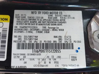 2015 Ford Fusion SE with VIN 1FA6P0H77F5122055, listed as a IAAI auction lot 42198056 with 151,029 mi miles and . Bid and sale history available at DreamBid. Image 9.