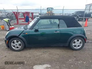 2005 MINI Convertible with VIN WMWRF33495TG11818, listed as a IAAI auction lot 42351446 with 100,033 mi miles and . Bid and sale history available at DreamBid. Image 14.