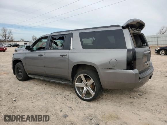 2015 Chevrolet Suburban LT with VIN 1GNSCJKC4FR263844, listed as a Copart auction lot 49231755 with Not provided miles and Salvage title. Bid and sale history available at DreamBid. Image 2.
