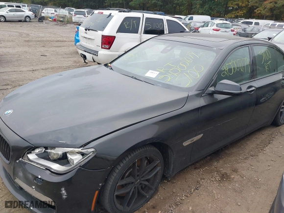 2015 BMW 7 Series 750i xDrive with VIN WBAYB6C57FD965802, listed as a IAAI auction lot 40588698 with 999,999 mi miles. Bid and sale history available at carsss.com. Image 13.