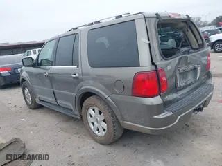 2004 Lincoln Navigator Luxury with VIN 5LMFU27RX4LJ41623, listed as a IAAI auction lot 41565114 with 214,590 mi miles. Bid and sale history available at carsss.com. Image 3.