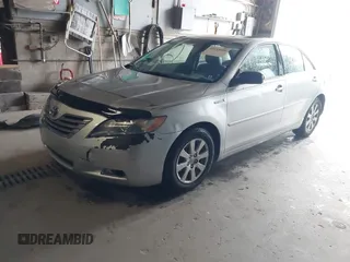 2007 Toyota Camry z VIN JTNBB46K973038138, wystawiony jako IAAI lot #42233680 z przebiegiem 230 480 mil mil oraz . Historia ofert i sprzedaży dostępna na DreamBid. Obrazek 2.