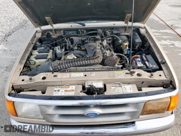 1997 Ford Ranger XLT with VIN 1FTCR14X3VPA62832, listed as a Copart auction lot 54961095 with 144,259 mi miles and Salvage title. Bid and sale history available at DreamBid. Image 11.