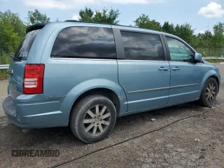 2009 Chrysler Town & Country Touring with VIN 2A8HR54X39R667914, listed as a Copart auction lot 66010904 with 214,583 mi miles and Salvage Title. Bid and sale history available at DreamBid. Image 3.