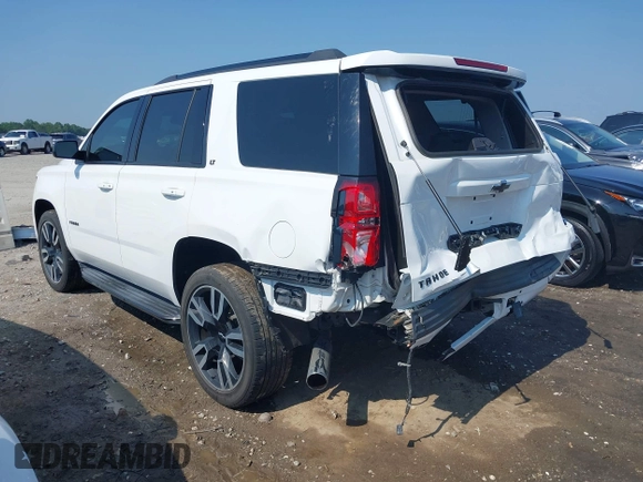 2019 Chevrolet Tahoe LT with VIN 1GNSCBKC2KR128944, listed as a IAAI auction lot 42600686 with 92,980 mi miles and . Bid and sale history available at DreamBid. Image 3.