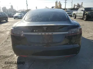 2014 Tesla Model S 60 с VIN 5YJSA1H16EFP40654, выставлен на аукционе Copart как лот 72070974 с пробегом Не указан миль и Списание • Salvage title. История ставок и продаж доступна на DreamBid. Изображение 6.