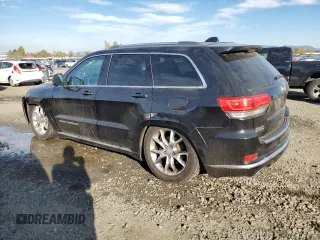 2015 Jeep Grand Cherokee Summit with VIN 1C4RJFJM8FC103117, listed as a Copart auction lot 77695364 with 150,483 mi miles and Salvage Title. Bid and sale history available at carsss.com. Image 2.