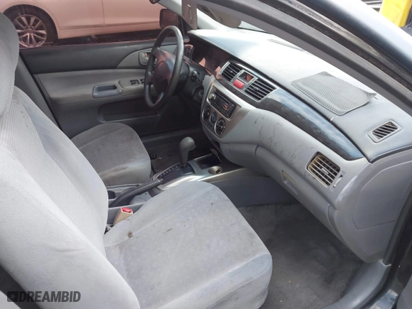 2004 Mitsubishi Lancer ES with VIN JA3AJ26E54U054570, listed as a IAAI auction lot 41592397 with 220,140 mi miles. Bid and sale history available at carsss.com. Image 5.