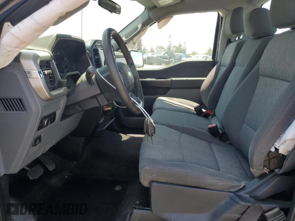 2021 Ford F-150 XL with VIN 1FTMF1C58MKE24095, listed as a Copart auction lot 57686455 with 60,583 mi miles and Salvage title. Bid and sale history available at DreamBid. Image 7.