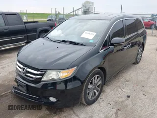 2015 Honda Odyssey Touring Elite with VIN 5FNRL5H97FB124565, listed as a IAAI auction lot 42358412 with 206,444 mi miles and . Bid and sale history available at DreamBid. Image 18.
