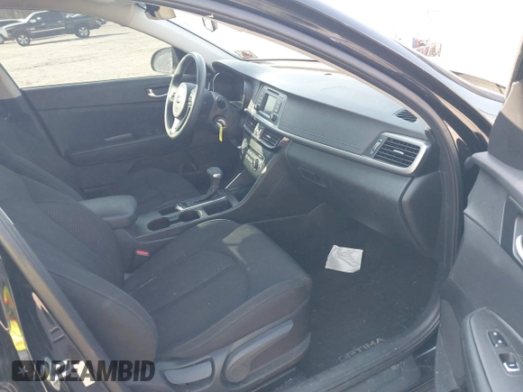 2016 Kia Optima LX with VIN 5XXGT4L36GG105637, listed as a IAAI auction lot 42013800 with 111,836 mi miles. Bid and sale history available at carsss.com. Image 5.