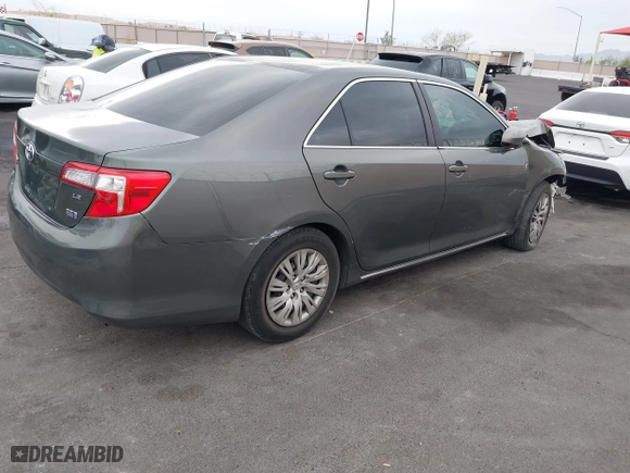 2014 Toyota Camry Hybrid LE with VIN 4T1BD1FK2EU134838, listed as a IAAI auction lot 41912000 with 132,000 mi miles. Bid and sale history available at carsss.com. Image 4.