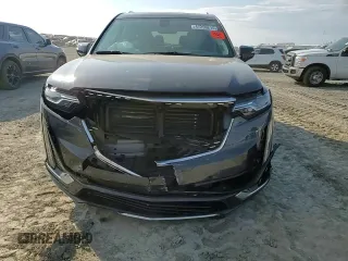 2021 Cadillac XT6 Premium Luxury z VIN 1GYKPCRS6MZ205831, wystawiony jako Copart lot #47259215 z przebiegiem 31 959 mil mil oraz Szkody całkowita. Historia ofert i sprzedaży dostępna na DreamBid. Obrazek 12.