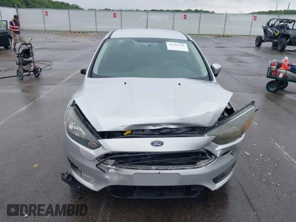 2017 Ford Focus SE with VIN 1FADP3FEXHL283329, listed as a IAAI auction lot 42347751 with 85,337 mi miles and . Bid and sale history available at DreamBid. Image 13.
