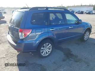 2011 Subaru Forester 2.5X Limited with VIN JF2SHAEC1BH754640, listed as a IAAI auction lot 42018735 with 130,780 mi miles. Bid and sale history available at carsss.com. Image 4.