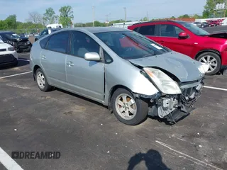 2005 Toyota Prius with VIN JTDKB20U950122932, listed as a IAAI auction lot 42026279 with 153,006 mi miles. Bid and sale history available at carsss.com. Image 1.