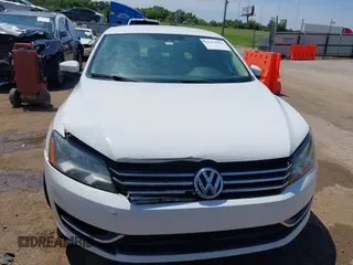 2013 Volkswagen Passat SE with VIN 1VWBP7A32DC007863, listed as a IAAI auction lot 42452096 with 207,083 mi miles and . Bid and sale history available at DreamBid. Image 12.