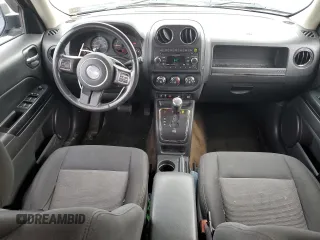 2014 Jeep Patriot Latitude with VIN 1C4NJRFB4ED588422, listed as a Copart auction lot 61401025 with 162,855 mi miles and Salvage title. Bid and sale history available at DreamBid. Image 8.