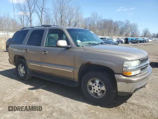 2003 Chevrolet Tahoe LT z VIN 1GNEK13Z43J136234, wystawiony jako Copart lot #51245445 z przebiegiem 227 769 mil mil oraz Czysty tytuł • Clean title. Historia ofert i sprzedaży dostępna na DreamBid. Obrazek 4.