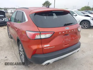 2020 Ford Escape Titanium Hybrid with VIN 1FMCU0DZ1LUB13684, listed as a IAAI auction lot 41629782 with 31,669 mi miles and . Bid and sale history available at DreamBid. Image 3.