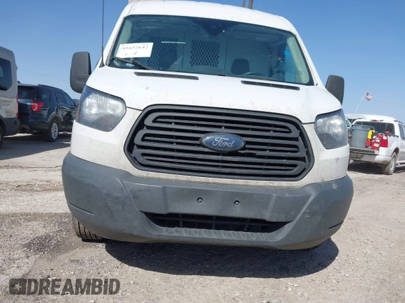 2018 Ford Transit with VIN 1FTYE1CMXJKA35806, listed as a IAAI auction lot 41652642 with 200,828 mi miles and . Bid and sale history available at DreamBid. Image 18.
