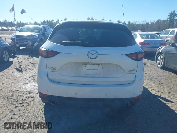 2019 Mazda CX-5 Grand Touring with VIN JM3KFBDM2K0672720, listed as a IAAI auction lot 41751196 with 51,632 mi miles and . Bid and sale history available at carsss.com. Image 16.