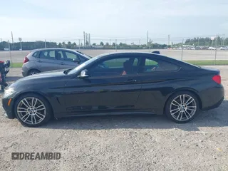 2015 BMW 4 Series 428i with VIN WBA3N3C56FK233866, listed as a IAAI auction lot 41983330 with 218,017 mi miles and . Bid and sale history available at DreamBid. Image 14.