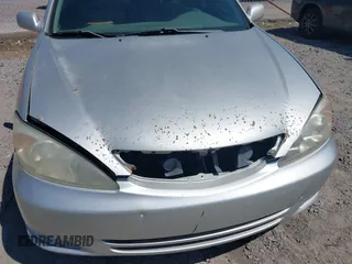 2003 Toyota Camry LE with VIN 4T1BE32K03U135482, listed as a IAAI auction lot 42145175 with 172,725 mi miles and . Bid and sale history available at DreamBid. Image 6.