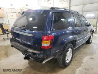 2002 Jeep Grand Cherokee Laredo with VIN 1J8GW48S92C197903, listed as a Copart auction lot 70524292 with 152,286 mi miles and Non Repairable. Bid and sale history available at carsss.com. Image 4.