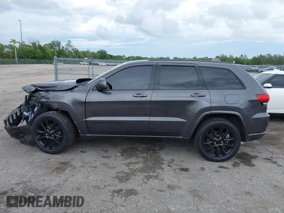 2018 Jeep Grand Cherokee Altitude z VIN 1C4RJEAG2JC428214, wystawiony jako IAAI lot #42661661 z przebiegiem 81 859 mil mil oraz . Historia ofert i sprzedaży dostępna na DreamBid. Obrazek 15.