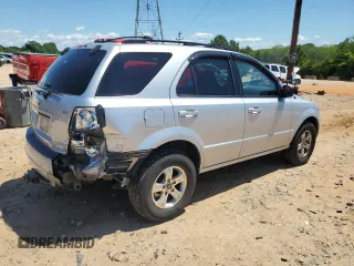 2005 Kia Sorento LX z VIN KNDJD733X55474717, wystawiony jako Copart lot #57565515 z przebiegiem 215 484 mil mil oraz Szkoda całkowita • Salvage title. Historia ofert i sprzedaży dostępna na DreamBid. Obrazek 3.