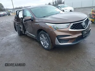 2019 Acura RDX w/Advance Pkg with VIN 5J8TC2H75KL017199, listed as a IAAI auction lot 41565130 with 67,880 mi miles. Bid and sale history available at carsss.com. Image 1.