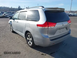 2014 Toyota Sienna LE with VIN 5TDJK3DC4ES088768, listed as a IAAI auction lot 41473251 with 100,512 mi miles and . Bid and sale history available at DreamBid. Image 3.