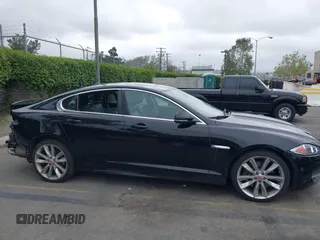 2015 Jaguar XF V6 Portfolio with VIN SAJWA0F77F8U65737, listed as a IAAI auction lot 42078529 with 62,229 mi miles. Bid and sale history available at carsss.com. Image 14.