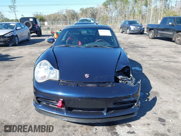 2004 Porsche 911 z VIN WP0AC29954S692825, wystawiony jako IAAI lot #41781530 z przebiegiem 28 942 mil mil oraz . Historia ofert i sprzedaży dostępna na DreamBid. Obrazek 13.