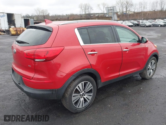 2014 Kia Sportage EX with VIN KNDPCCAC9E7552904, listed as a IAAI auction lot 41980439 with 184,871 mi miles and . Bid and sale history available at DreamBid. Image 4.