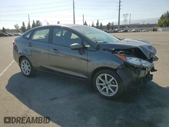 2019 Ford Fiesta SE z VIN 3FADP4BJ4KM106189, wystawiony jako Copart lot #57913315 z przebiegiem Nie podano mil oraz Szkoda całkowita • Salvage title. Historia ofert i sprzedaży dostępna na DreamBid. Obrazek 14.