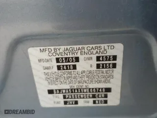 2005 Jaguar X-Type 3.0L with VIN SAJWA51AX5WE66748, listed as a Copart auction lot 49601374 with 129,709 mi miles and Salvage Title. Bid and sale history available at carsss.com. Image 12.