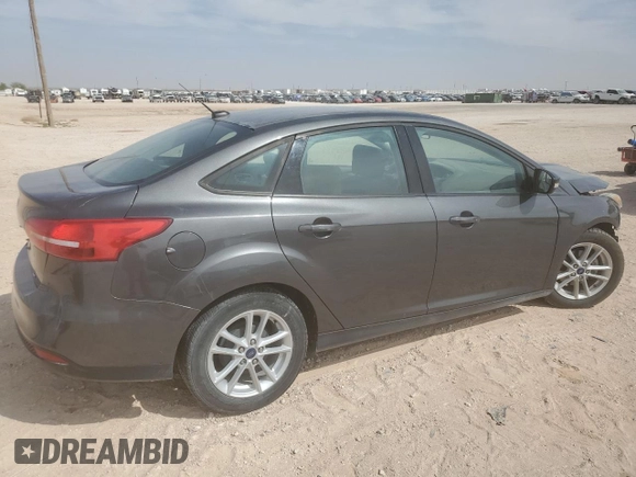 2017 Ford Focus SE with VIN 1FADP3F21HL308222, listed as a Copart auction lot 50707285 with 87,111 mi miles and Salvage title. Bid and sale history available at DreamBid. Image 3.
