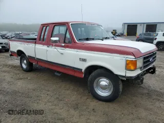 1990 Ford F-150 with VIN 1FTEX15N5LKB16198, listed as a Copart auction lot 52635485 with 33,433 mi miles and Salvage Title. Bid and sale history available at carsss.com. Image 4.