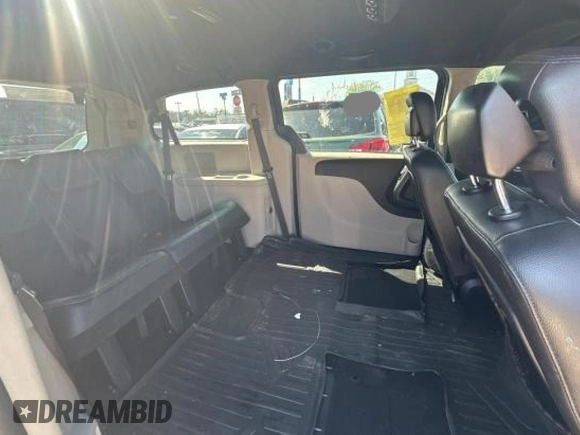 2014 Dodge Grand Caravan SXT with VIN 2C4RDGCG1ER308403, listed as a Copart auction lot 47603045 with 131,847 mi miles and Clean Title. Bid and sale history available at DreamBid. Image 6.