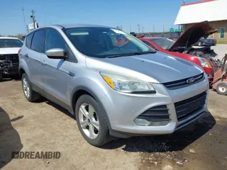 2015 Ford Escape SE with VIN 1FMCU0G74FUB93125, listed as a IAAI auction lot 41923277 with 203,183 mi miles. Bid and sale history available at carsss.com. Image 1.