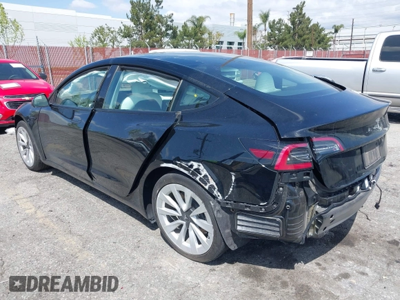 2022 Tesla Model 3 with VIN 5YJ3E1EA4NF316127, listed as a IAAI auction lot 41939191 with 30,857 mi miles. Bid and sale history available at carsss.com. Image 3.