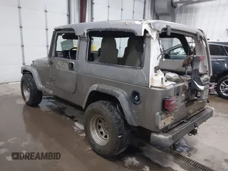 2006 Jeep Wrangler Unlimited LWB with VIN 1J4FA44S96P714309, listed as a IAAI auction lot 41252391 with 164,720 mi miles. Bid and sale history available at carsss.com. Image 3.