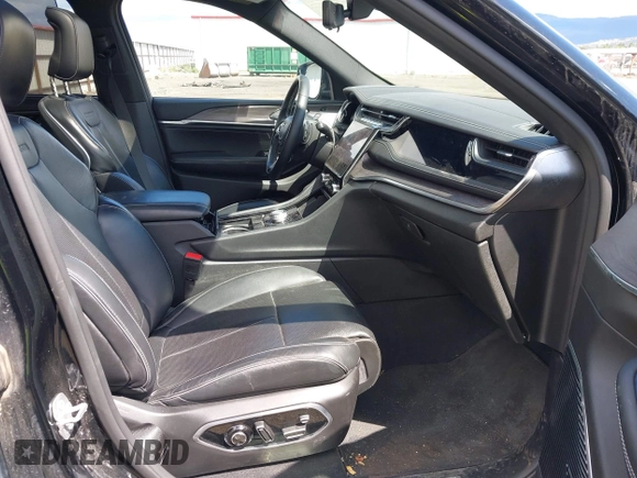 2023 Jeep Grand Cherokee Overland with VIN 1C4RJHDG2PC526889, listed as a IAAI auction lot 42247177 with 71,390 mi miles and . Bid and sale history available at DreamBid. Image 5.